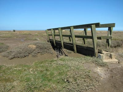 Bridge over tidal creek in Stiffkey salt marshes